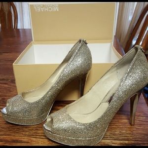 Silver Michael kors heels.